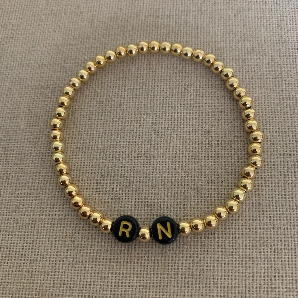 Registered Nurse (RN) gold beaded bracelet